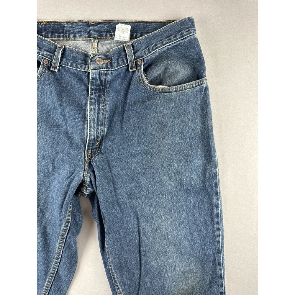 Vintage Levi's 560 Loose Tapered Jeans 34x30 Medium Wash Made In USA